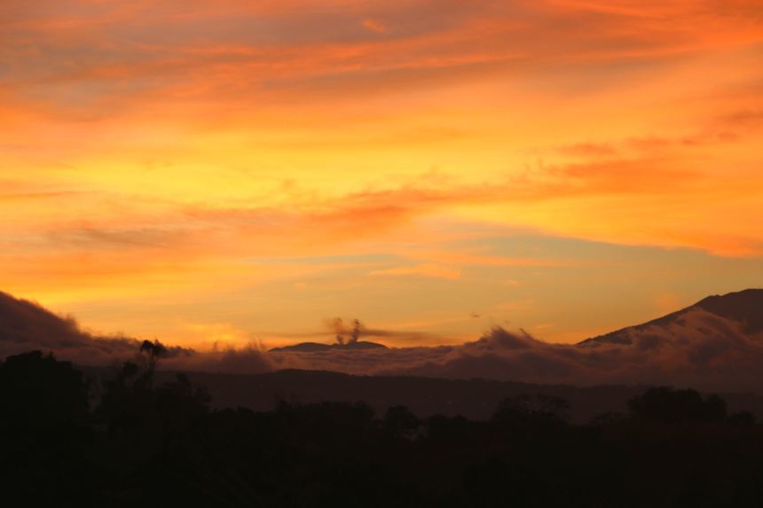 Waking with the sun in the cloudforest, volcanic releases in the background